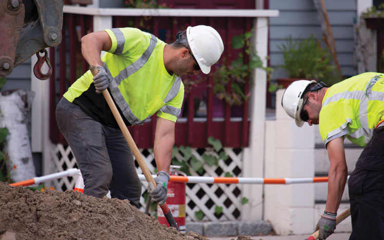 Workers digging